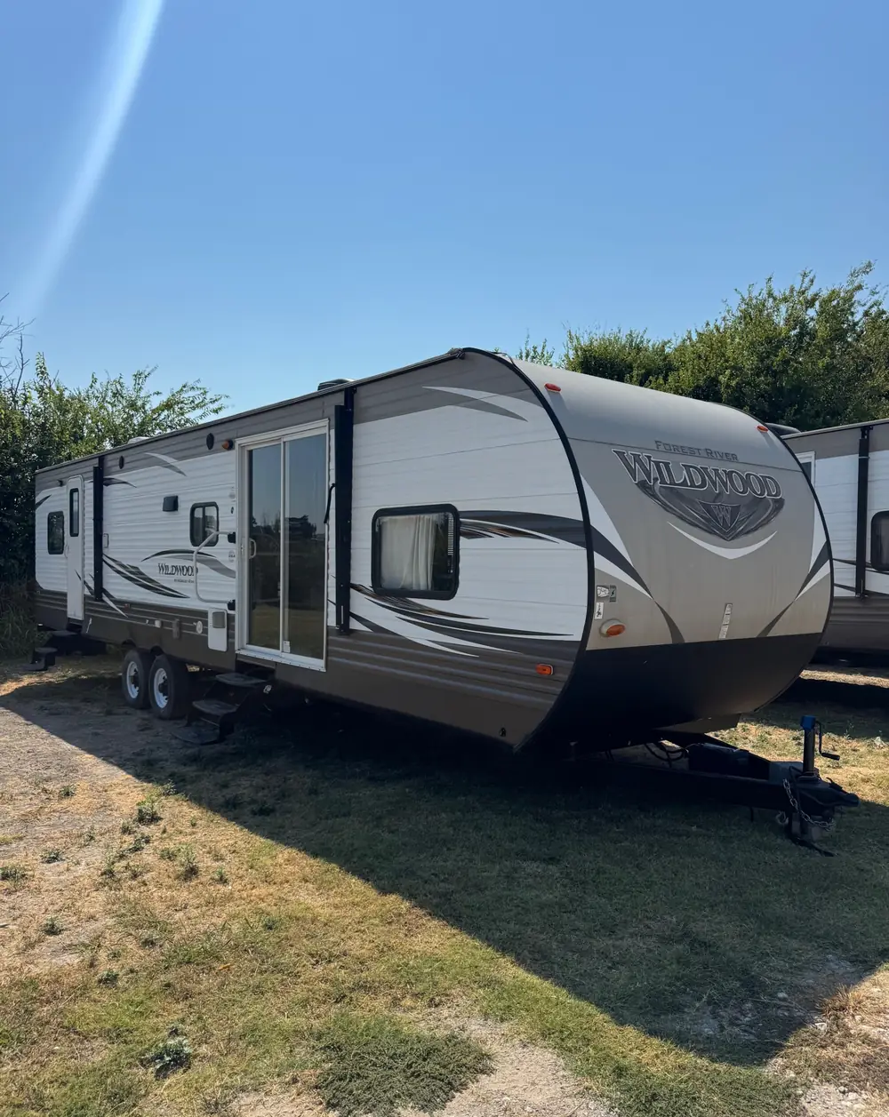 2018 Forest River Wildwood 36BHBS travel trailer, door side
